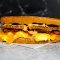 Sourdough, Bacon, Sausage, Egg & Cheddar · 2 scrambled eggs, melted Cheddar cheese, smoked bacon, breakfast sausage, and Sriracha aioli...