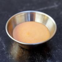 Sriracha Aioli Side · Mild-Medium spice level aioli with a splash of lime juice.