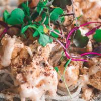 Ebi Mayo · Chopped jumbo shrimp tempura on a bed of rice noodles, topped with crushed almonds; served w...