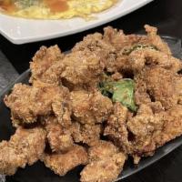 鹽酥雞 / Popcorn Chicken · Bite sized breaded and fried chicken.