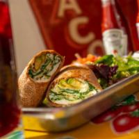 Laura’S Wrap · 2 egg whites, avocado, feta cheese, and grilled spinach in wheat tortilla served with your c...