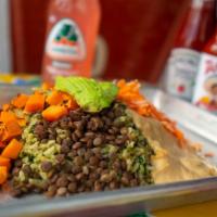 Vegan Pesto Brown Rice Bowl · Brown rice, vegan cashew pesto, lentils, sweet potato, carrots. Spinach hummus, pepitas avoc...
