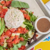 Albacore Tuna Salad · Mixed greens topped with a scoop white albacore tuna, avocados, sliced cucumbers and tomatoe...