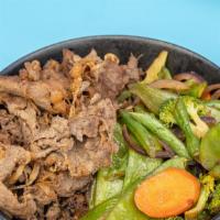 Bulgogi (Beef) Rice Bowl · Bulgogi grilled beef. Served with Asian style sautéed vegetables on a bed of white rice.