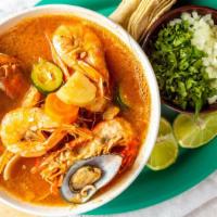 7 Mares (7 Seafood Soup) · Octupos, jaiba, fish, clam, mussels, abalone, vegetables.
