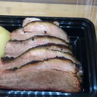 Small Combo · Choice of your favorite slow-smoked meat with two sides and one bread