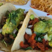 Los Tres Amigos · Three mini tacos made with handmade tortillas, your choice of meat, onion, cilantro, guacamo...