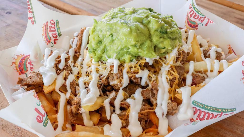 Asada Fries · Seasoned fries topped w/ Choice of Meat, Sour Cream, Guacamole, Cheese