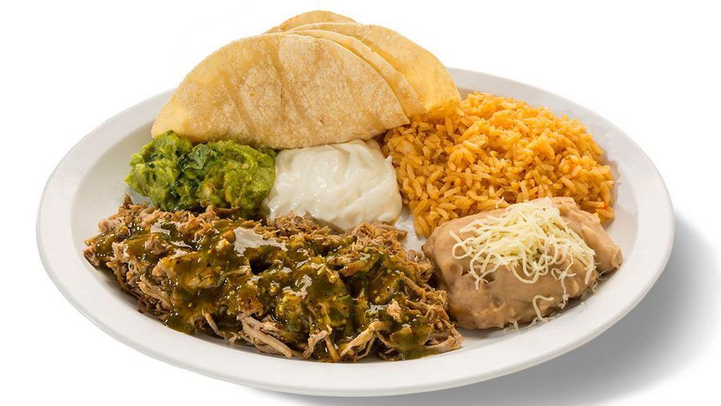Chile Verde Dinner Plate · Chile Verde with a side of beans, rice, guacamole, sour cream & served with three handmade tortillas.
