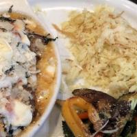 Parmigiana · Chicken or eggplant. Parmigiana romano floured, sauteed, and baked. Served with rice pilaf a...