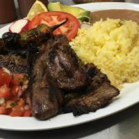 Carne Asada · Includes rice, beans, salad and 2 tortillas