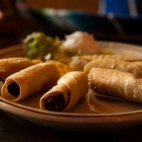 Taquitos · Choice of chicken or beef served with sour cream and guacamole.