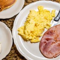 Diced Ham & Eggs · Richard’s favorite. Smoked ham is diced and sautéed into three scrambled eggs; served with p...