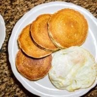 Two By Four · Two eggs, any style with four buttermilk pancakes.