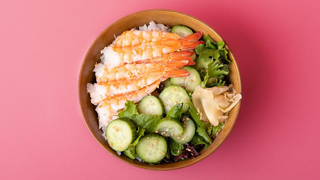 Shrimp Rice Bowl · Shrimp over sushi rice with sliced cucumber, radish, ginger, crunchy greens, and sesame seeds.
