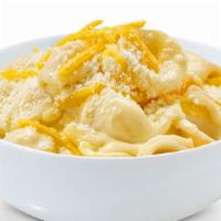 House Mac' N Cheese · Elbow Pasta, House creamy Alfredo Sauce, Four Cheese, Parmesan