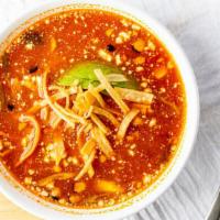 Tortilla Soup · Chicken tomato broth with shredded chicken, avocado, queso fresco, grilled corn, and tortill...