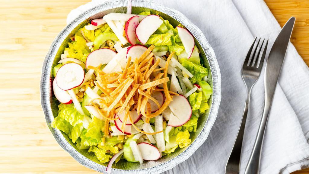Mexquite Salad · Romaine lettuce, jicama, onions, cucumbers, radish, and tomatoes tossed with cilantro lime dressing.