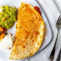 Mexquite Quesadilla · Mexquite favorites. Flour tortilla with melted cheddar and jack cheese served with guacamole...