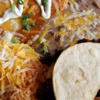Enchilada · Choose one item with your choice of shredded chicken or beef, cheese or ground beef served w...