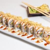 Shrimp Tempura Roll · In: shrimp tempura, stick crab, avocado, cucumber. Out: crab, tempura bits, eel sauce.