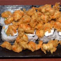 Popcorn Crawfish · California roll topped with deep fried crawfish.