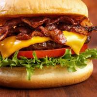 Bacon Cheeseburger Combo · Sauce, lettuce, pickles, onions, tomatoes, and bacon.