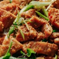 Ginger Chicken Don · Diced white meat chicken with our ginger sauce/green onion served over steamed white rice an...