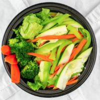 Steamed Vegetable Don · Broccoli, carrots, zucchini and bell peppers steamed served over steamed white rice & a side...
