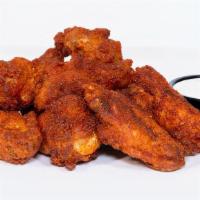 Nashville Hot Wings · Dipped in Fire oil and finished with Hot Haus Rub. Served with choice of dipping sauce