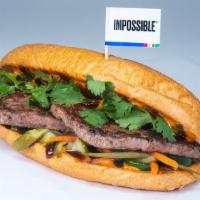 Take Bánh Mì · impossible patty, cilantro, jalapenos, hoisin sauce, spicy veganaise, pickled vegetables; se...