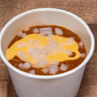 Haus Chili · Creekstone Farm, hormone and antibiotic free all beef chili topped with cheese sauce and dic...