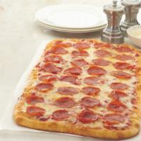 Artisan Pepperoni Flat Bread Pizza · Traditional flat bread pizza with shredded mozzarella and pepperoni.