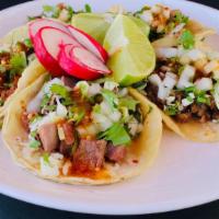 Tacos · Choice of meat, onion, cilantro cabbage.