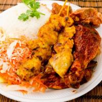 Bbq Combo · Thai BBQ chicken, sweet pork ribs, and chicken satay, served with steamed white rice and sal...