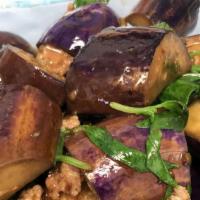 Eggplant With Spicy Bean Sauce · Choice of meat sauteed with eggplant in spicy black bean sauce, indicate hot and spicy.