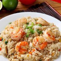 Fried Rice · Choice of meat stir-fried with rice, onion, carrot, and egg.