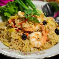 Pineapple Fried Rice · Combination of shrimp, chicken,cashew nut, pineapple, and raisin stir-fried together with ri...