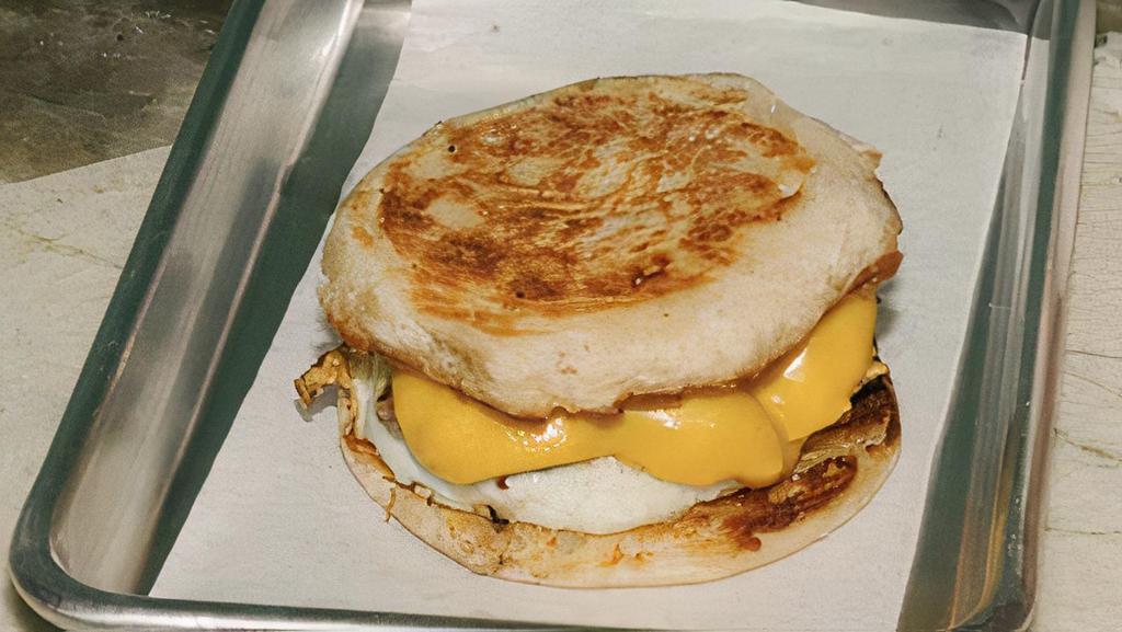 Breakfast Sandwich · Sausage patty, eggs and cheese on a toasted english muffin