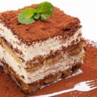 Tiramisu Big Ladyfinger · Layers of espresso drenched ladyfingers separated by mascarpone cream and dusted with cocoa ...