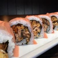 Salmon Skin Roll · IN: Salmon Skin, Wonton Crunch and Gobo Carrot wrapped in Soy Paper