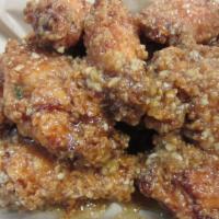 Soy Garlic Chicken Wings · Deep fried and tossed with soy garlic sauce.
