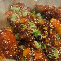 Korean Style Spicy Chicken · Tossed with our traditional korean spicy sauce with mixed nuts.