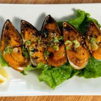 Baked Mussels (5Psc) · Baked with house spicy mayo and scallions on top.
