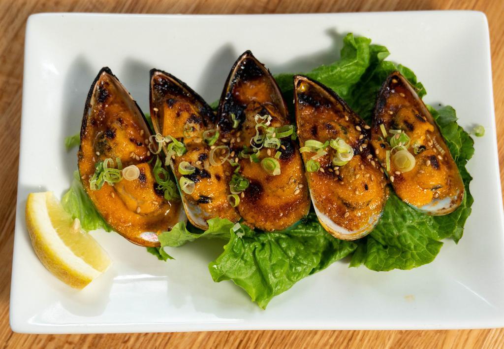 Baked Mussels (5Psc) · Baked with house spicy mayo and scallions on top.