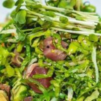 Seafood Seaweed Salad · Tuna, shrimp, tobiko, shredded lettuce, crab salad and avocado mixed with seaweed salad serv...