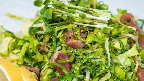 Seafood Seaweed Salad · Tuna, shrimp, tobiko, shredded lettuce, crab salad and avocado mixed with seaweed salad served with lemon wedges.