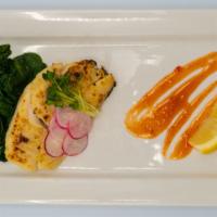 Miso-Yaki Cod · Seasonal cod broiled with white miso, served with sautéed spinach. Gluten free