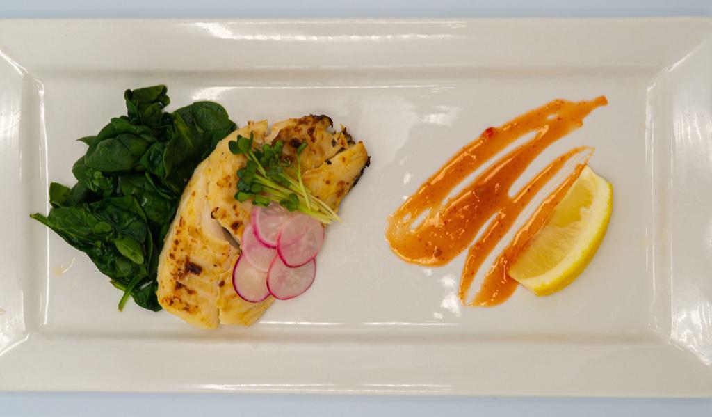 Miso-Yaki Cod · Seasonal cod broiled with white miso, served with sautéed spinach. Gluten free