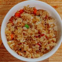 Bacon Fried Rice · Mixed veggies, bacon, egg, butter and soy sauce.